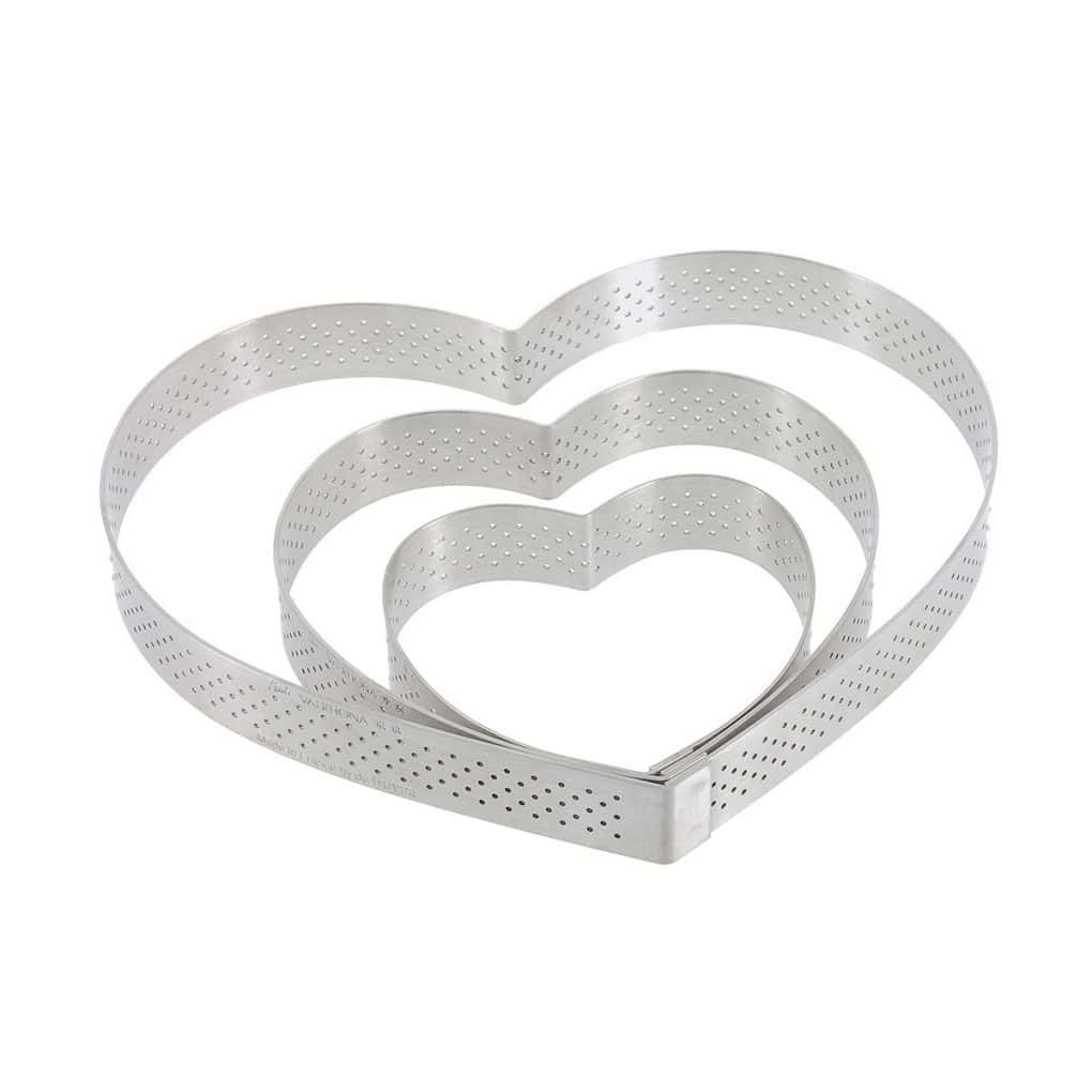 cercle-a-tarte-coeur-valrhona-inox-perfore-ht-2-cm.jpg Cercle perforé inox cœur DIAM:12cm H:2cm – Image 1