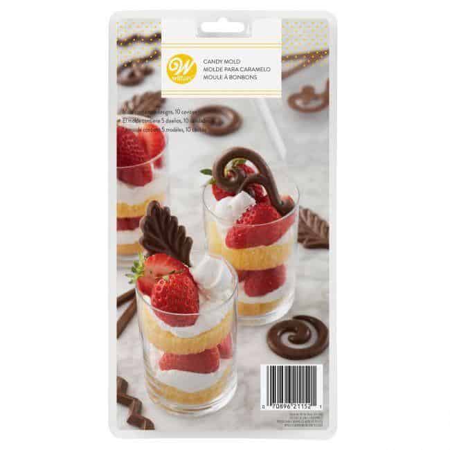 moule-candy-dessert-symboles-wilton-1-44526721237331_1800x1800 Moule chocolat plastique décors symboles – Image 1