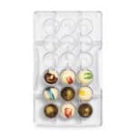 Moule à chocolat polycarbonate hémisphère perforée Ø 25 x 12,5 H mm 18 cavités